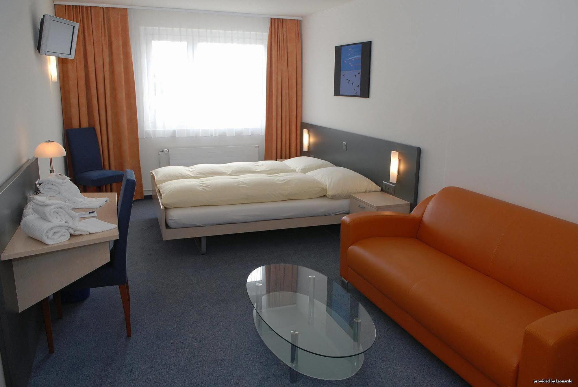 Airporthotel เกรนเคน ภายนอก รูปภาพ